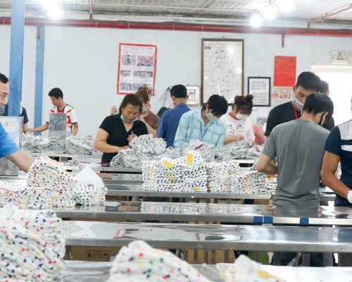 Garments made with dye sublimation printing in garment sewing factory